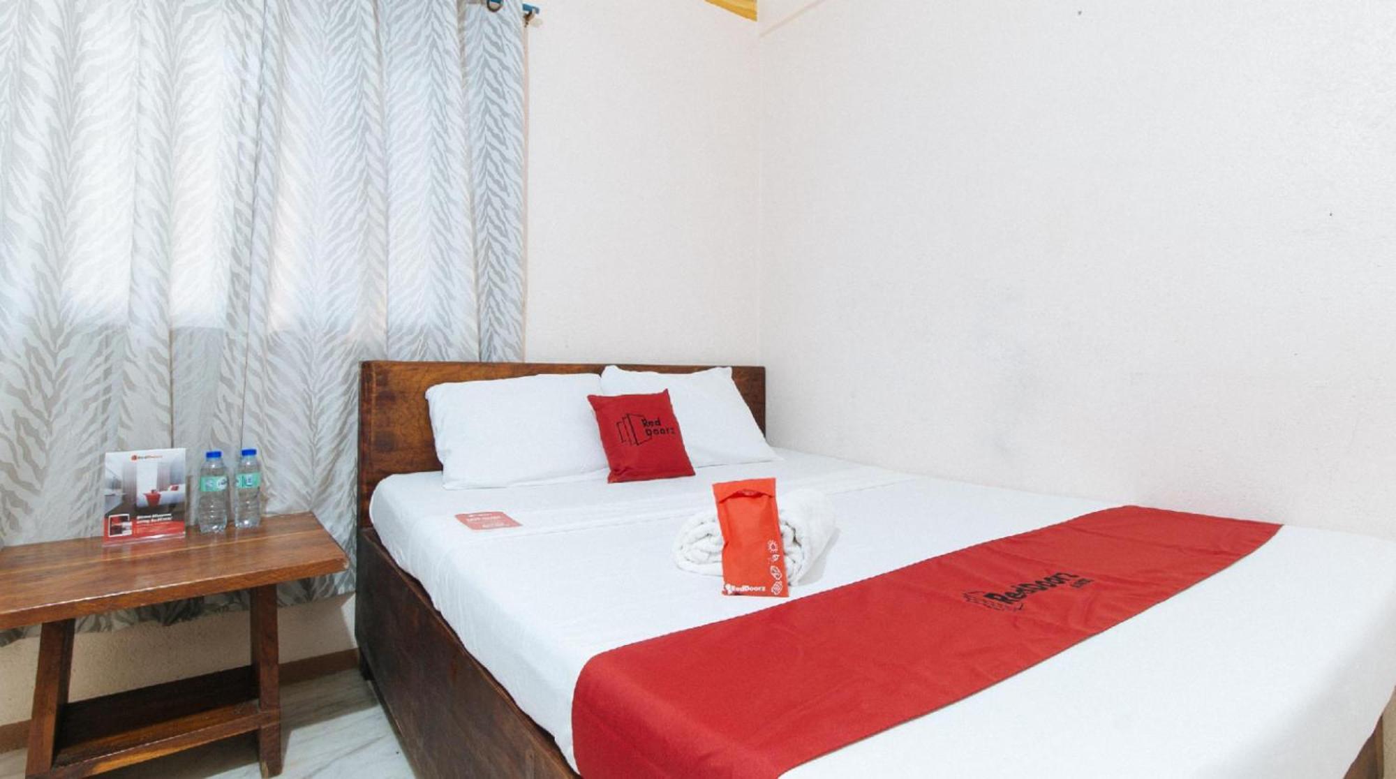 Reddoorz Hostel At Megans Paradisio Beach Resort Сан-Антонио Экстерьер фото